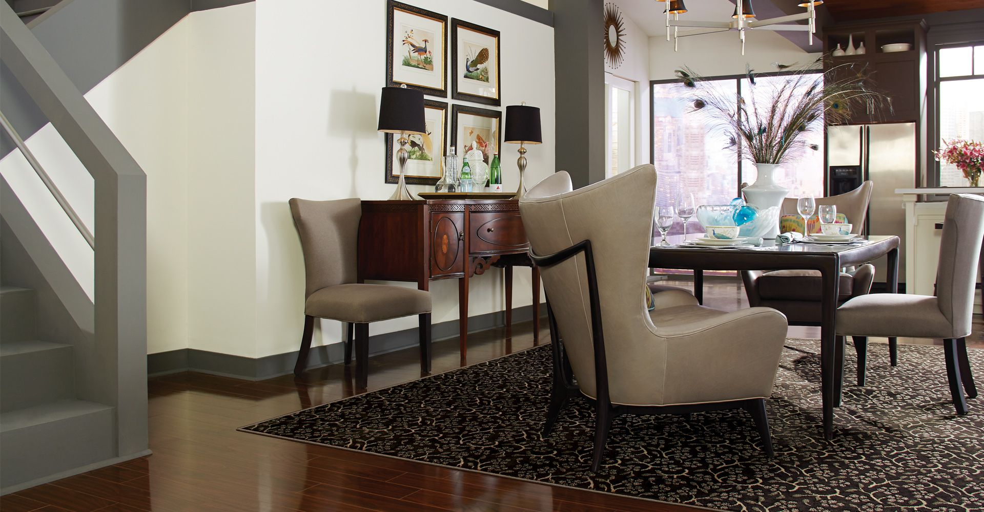 A front door opening to luxury vinyl floors
